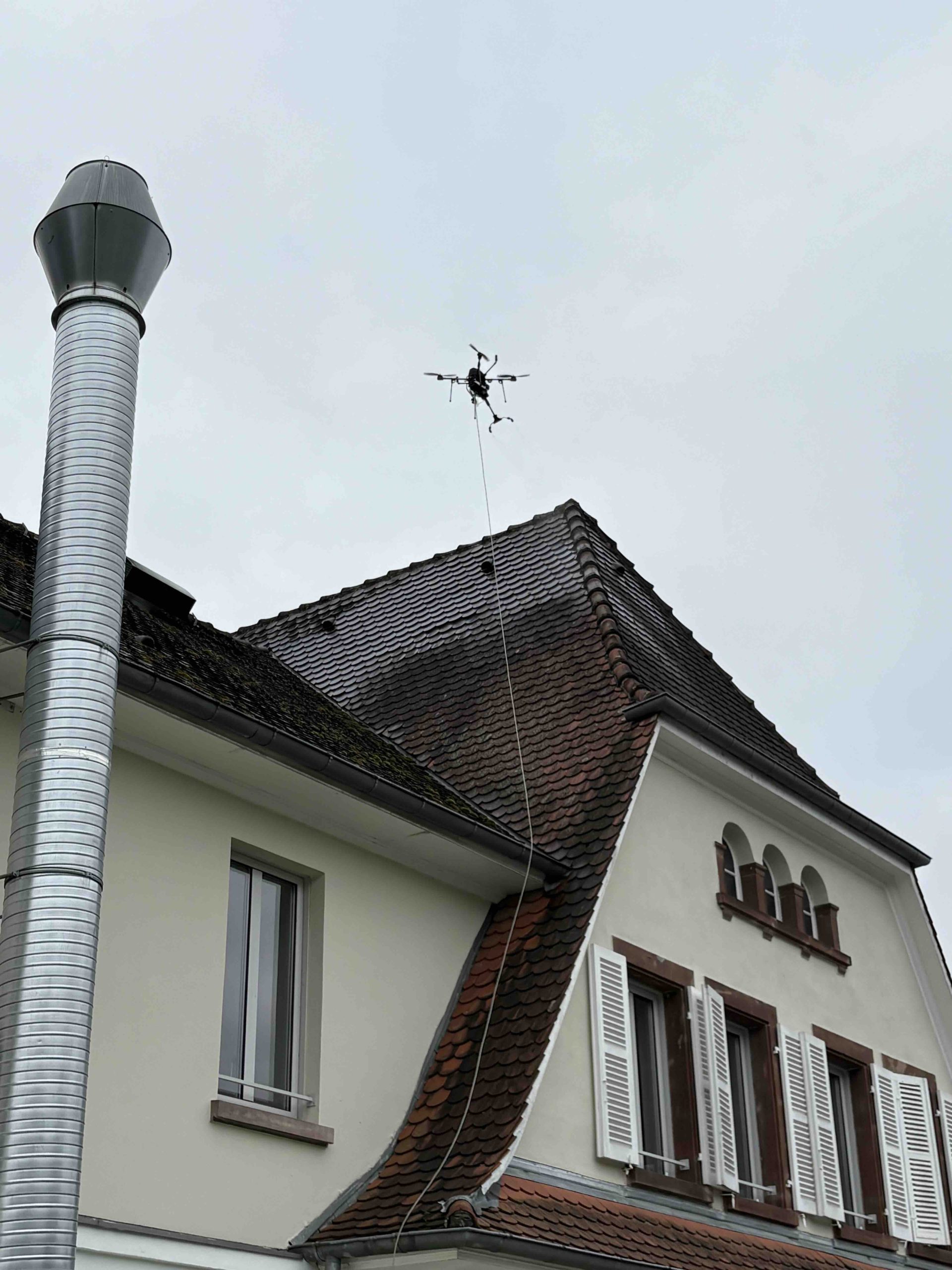 Nettoyage et démoussage de toiture par drone à Munster proche de Gunsbach